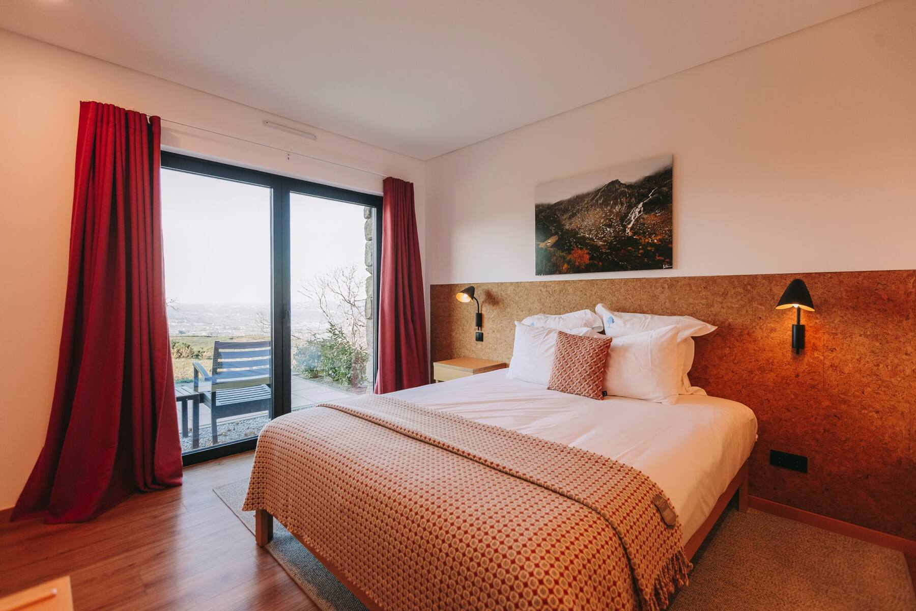 A premium terrace room with a view to the mountains